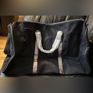 Victoria’s Secret Stylish Black and gray overnight bag